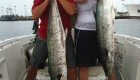 Scott's customers with kingfish on the outcast